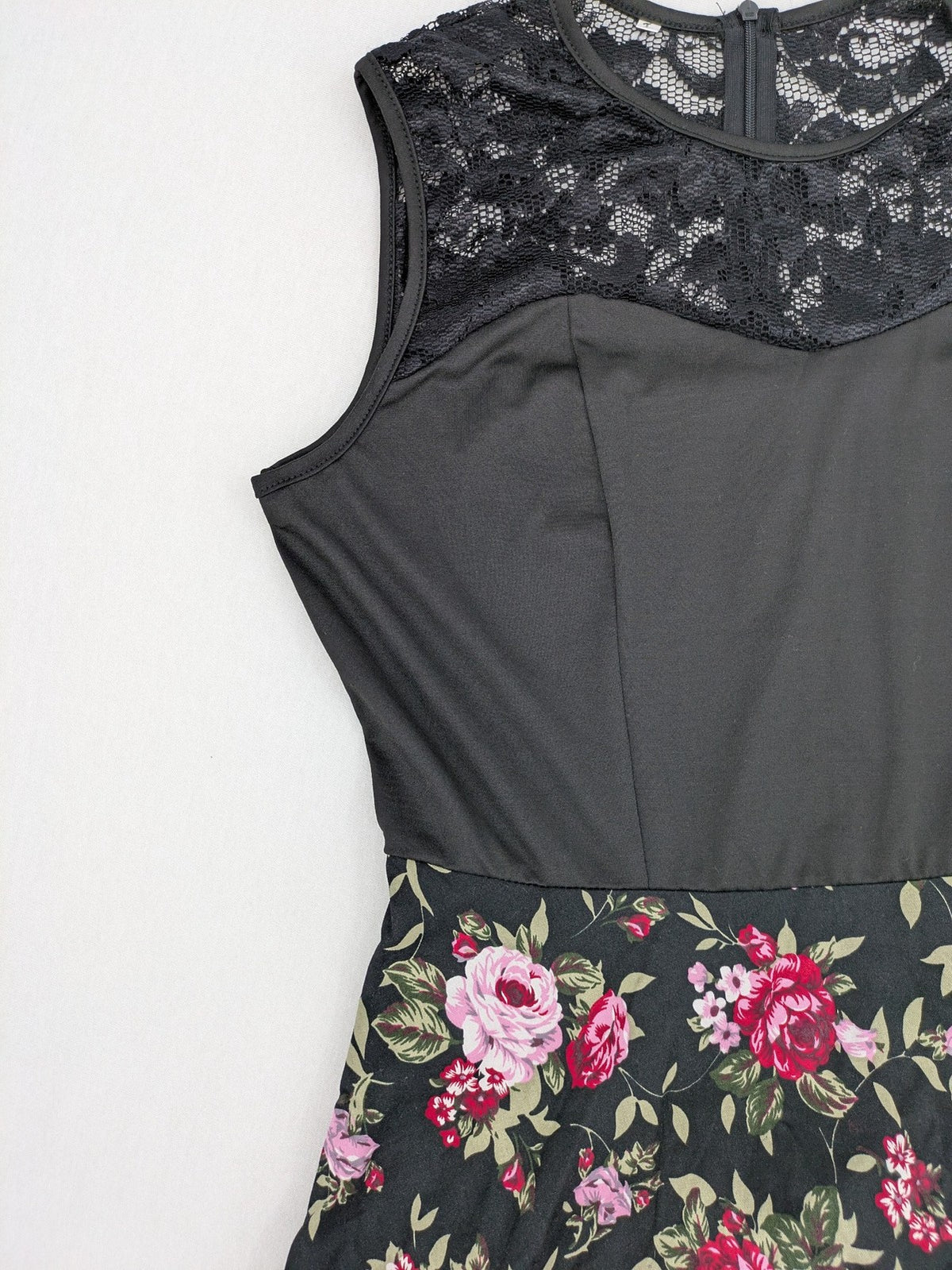 M/L black A-line dress with floral skirt and lace trim details.