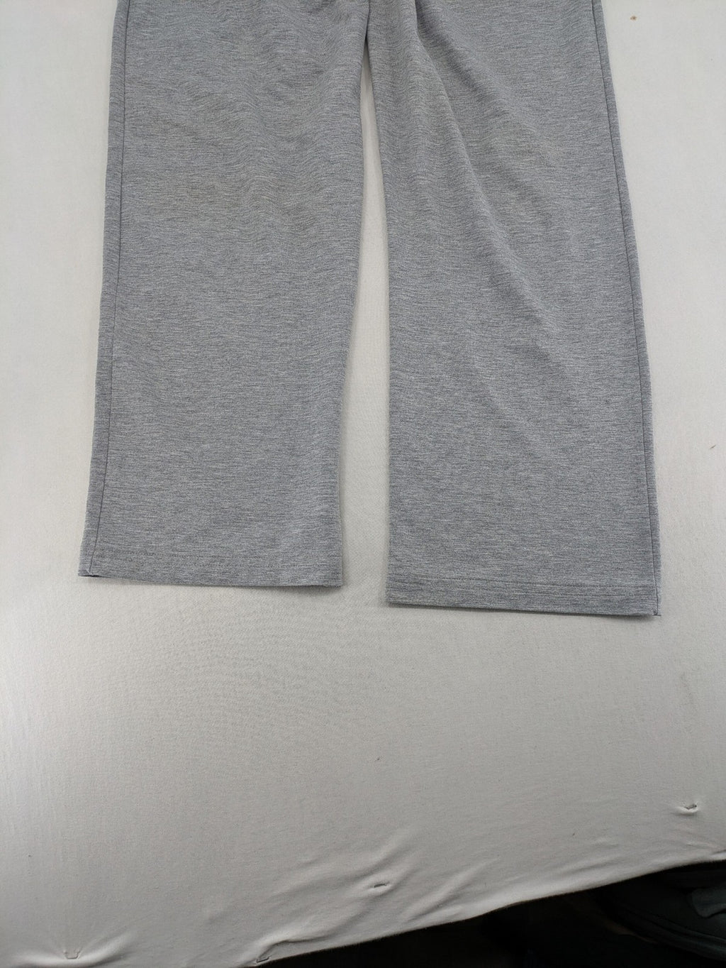 Falconhill grey jogging pants with elastic waistband, drawstring, and stylish black accent pockets.