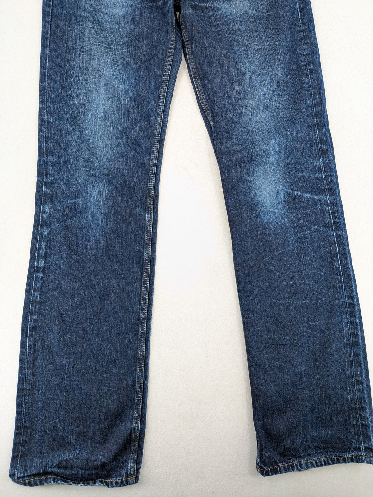 W32 blue straight jeans with classic 5-pocket design and dark wash denim.