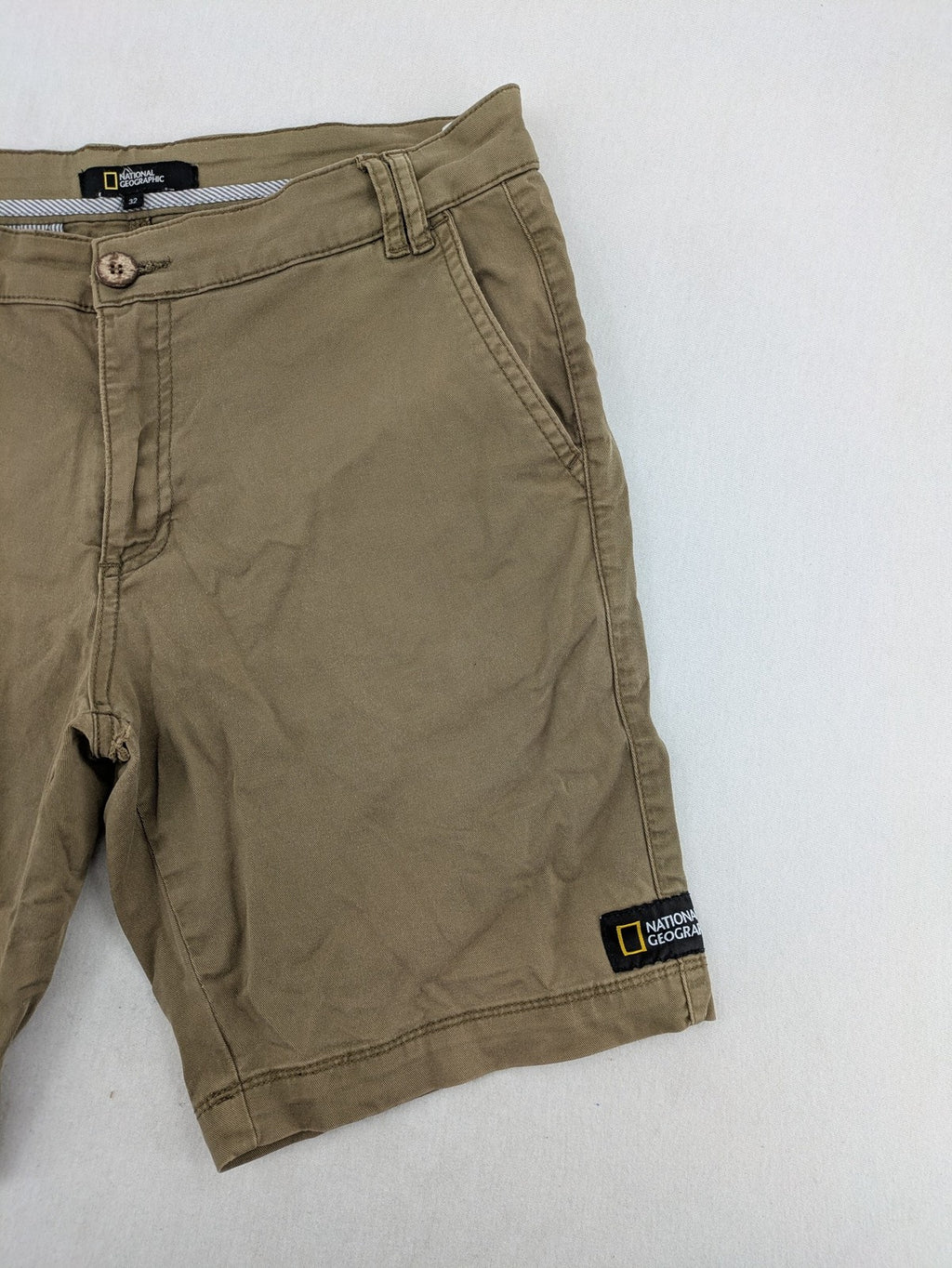 National Geographic khaki shorts flat front design with subtle logo patch