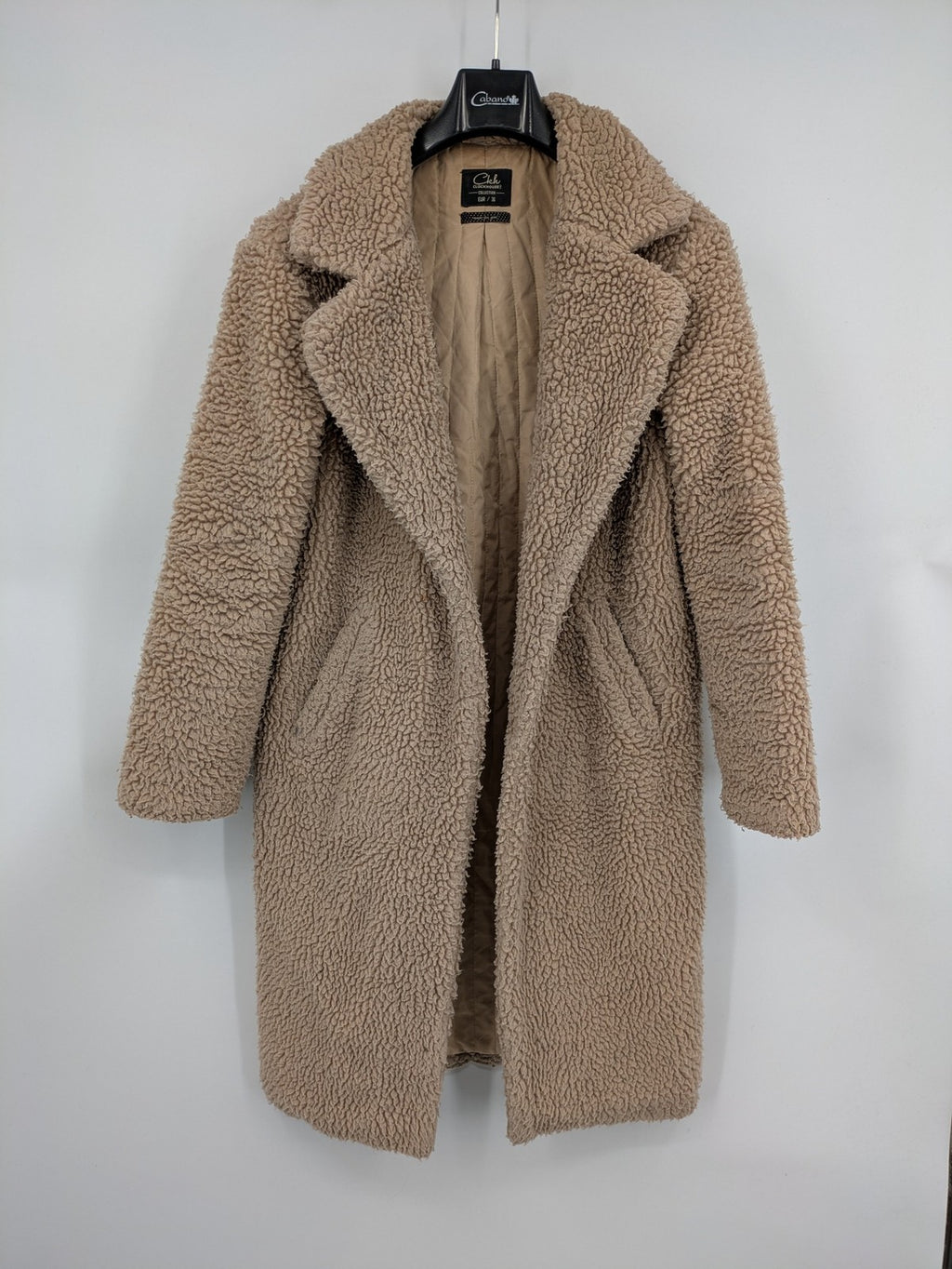 Clockhouse beige teddy coat longline design soft faux fur material with notched collar.