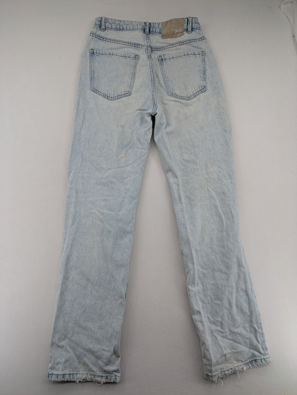 FB Sister blue mom jeans high waist distressed denim with knee rips and classic fit.