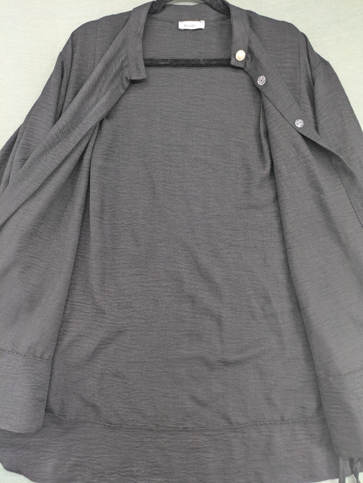 Damen grey turtle neck jumper with balloon sleeves and side ties, high-low hem.