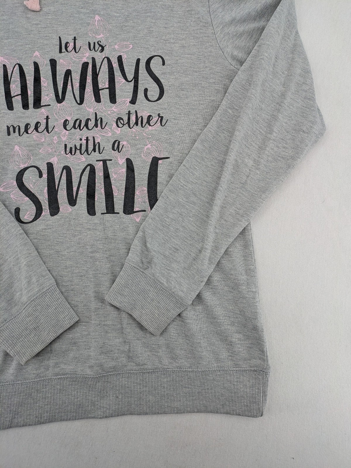 Colours Of The World grey knit jumper with pink drawstring, inspirational graphic print, soft material.