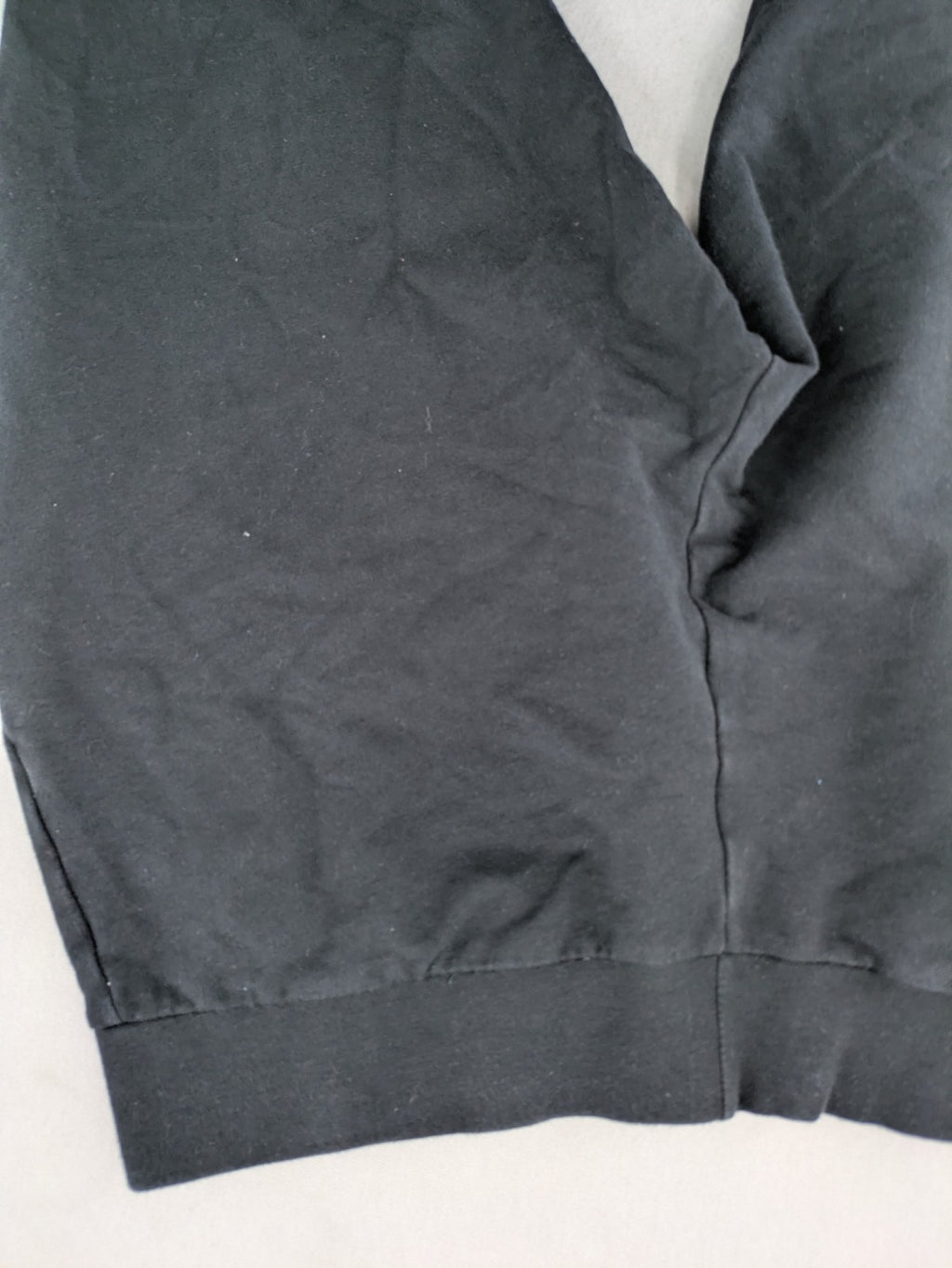 Manguun Sports grey jogger pants soft cotton blend with subtle logo embroidery and elastic waistband.