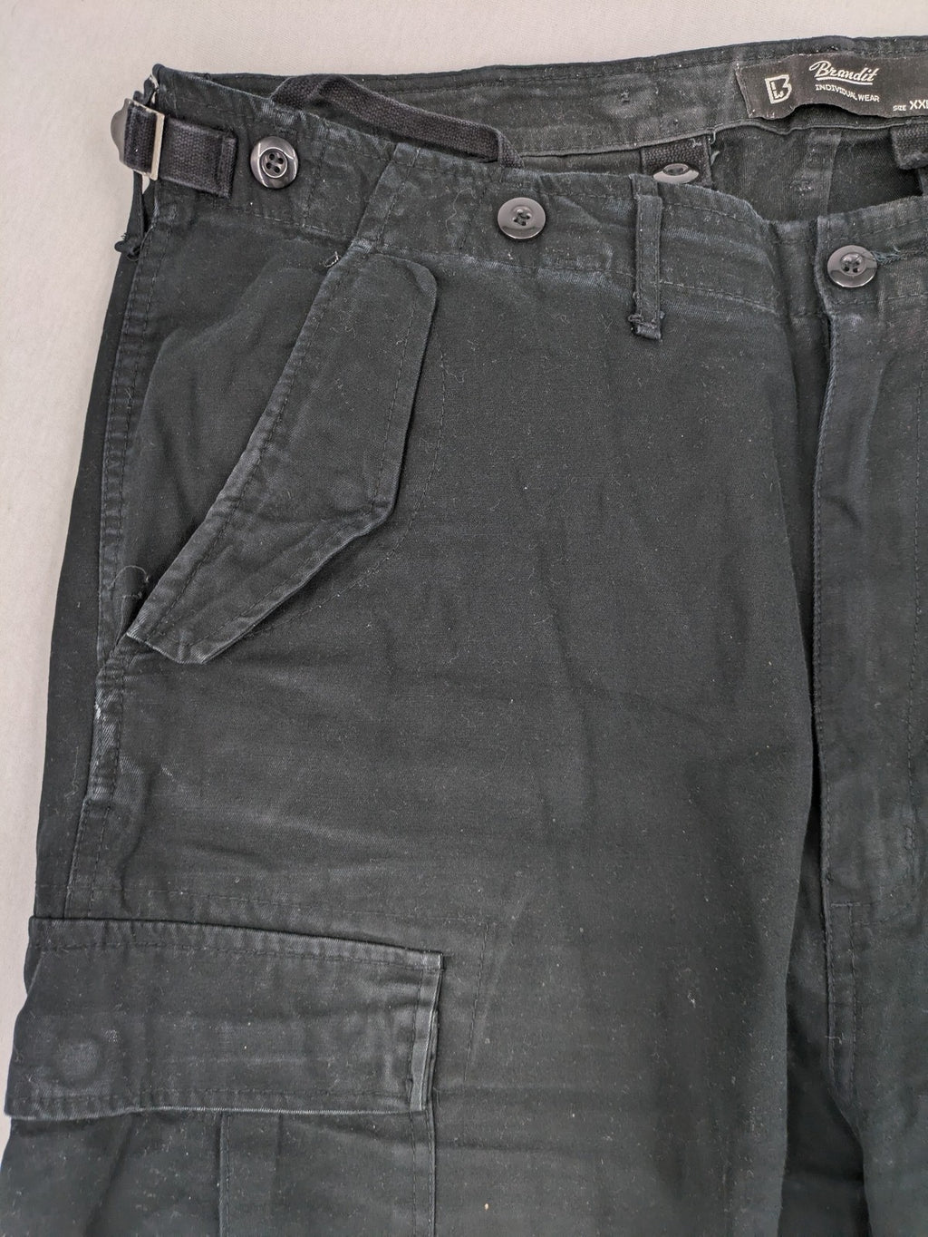 Brandit hunting & tactical pants grey vintage army style with cargo pockets and button fly.