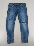 Zara blue straight jeans with distressed ripped knees and button-fly closure.