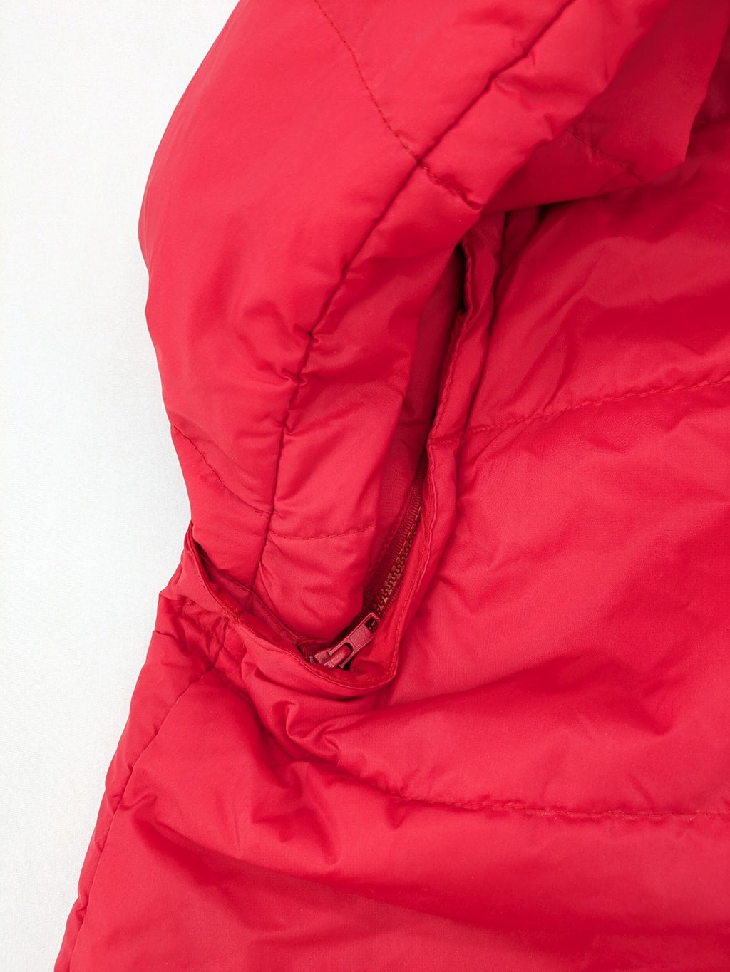Rox red puffer vest with detachable sleeves and hood, vintage style.