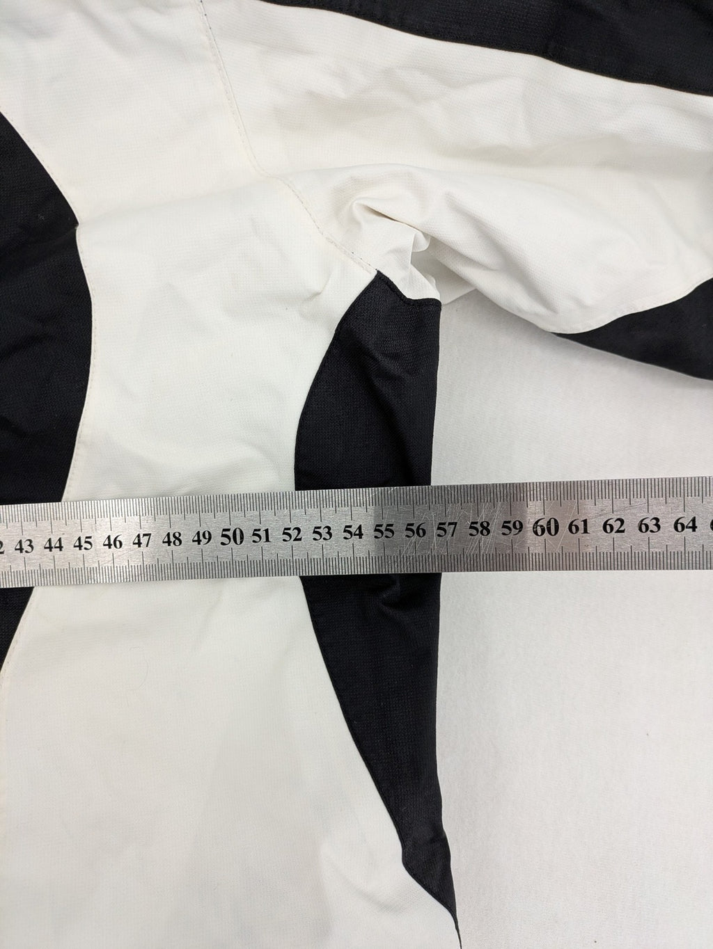 Icepeak black and white ski snowboard jacket with RECCO logo and quilted insulation.