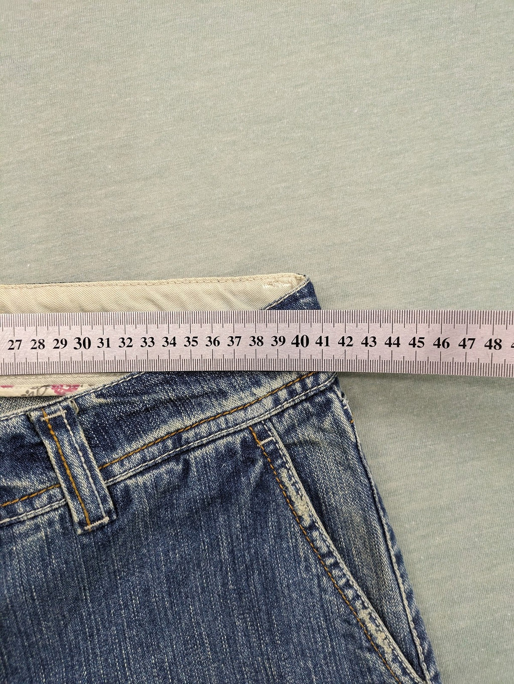 Stefanel blue straight jeans with cuffed hem and classic 5-pocket design.