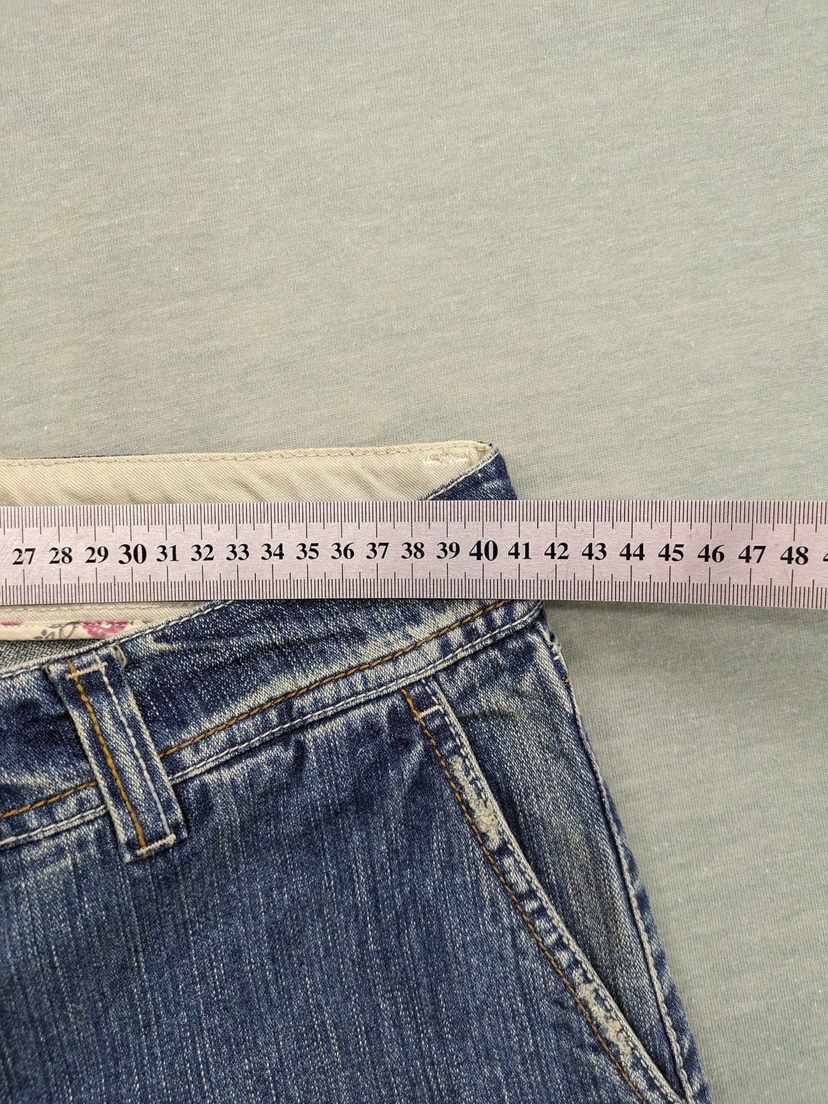 Stefanel blue straight jeans with cuffed hem and classic 5-pocket design.