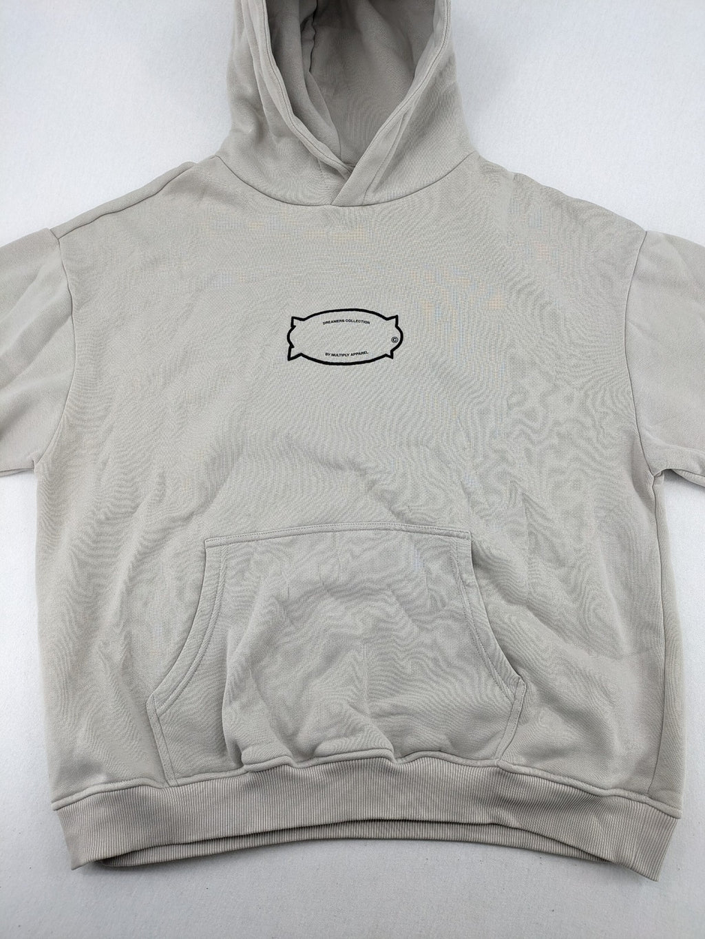Multiply grey zip-through hoodie with embroidered logo and large "MLTPLY" print on back.