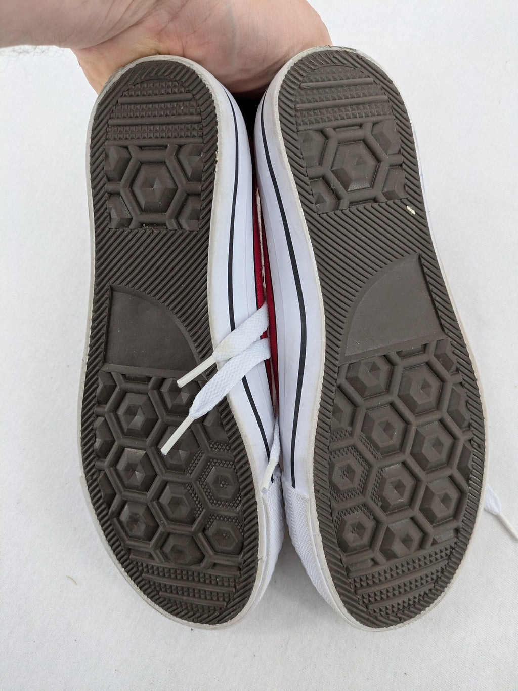 Sneaker low-top canvas sneakers red upper with white laces and rubber sole