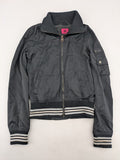 Ann Christine black bomber jacket with striped ribbed collar and cuffs, zip closure.