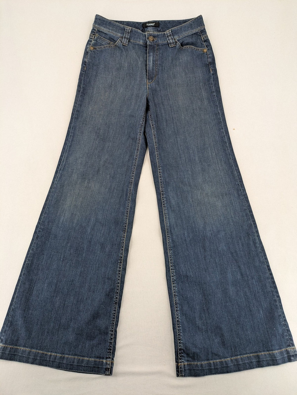 Rosner blue wide leg jeans with colorful embroidery on back pockets.