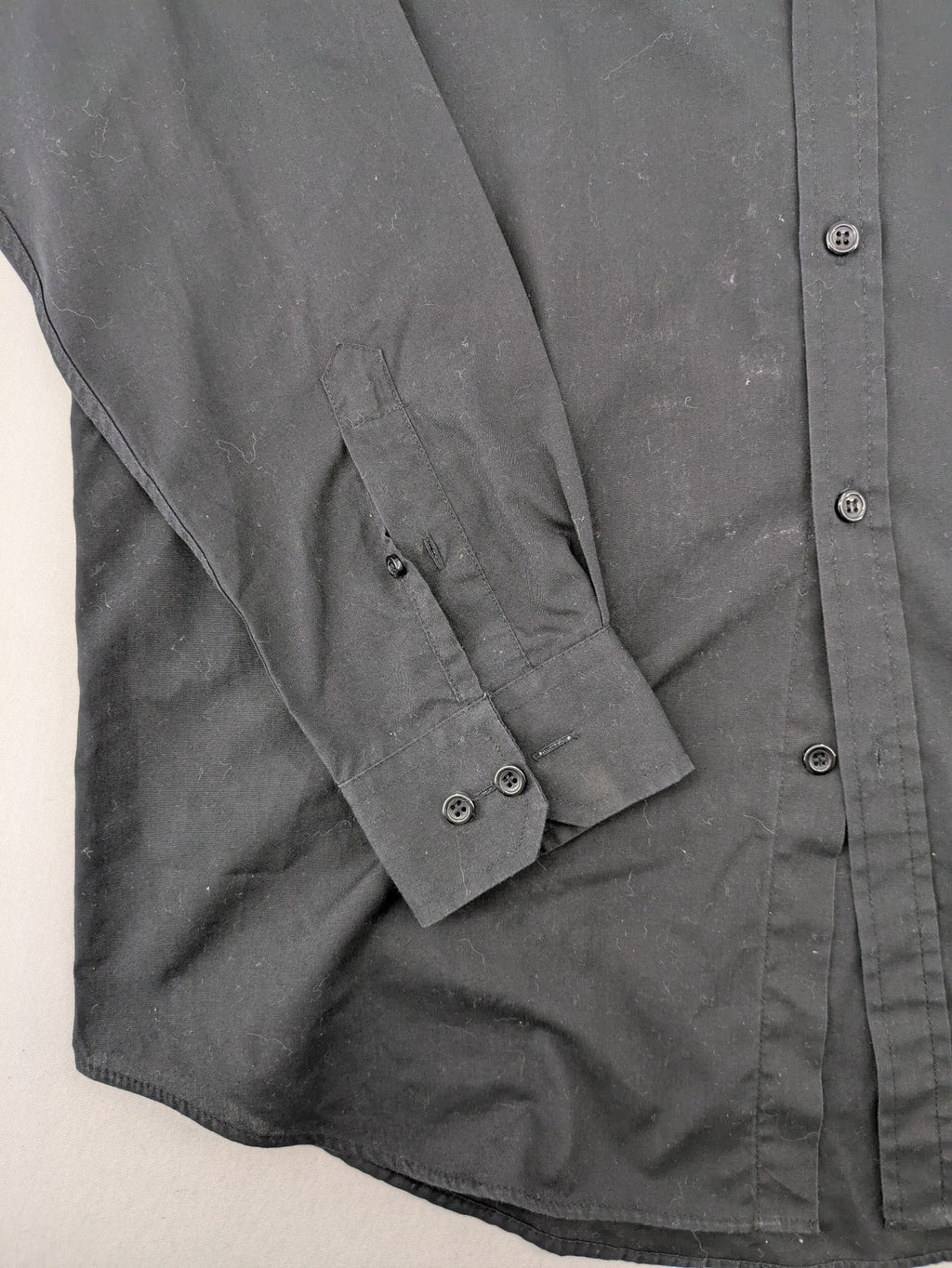 Cedarwood State black long sleeve shirt with classic collar and chest pocket.