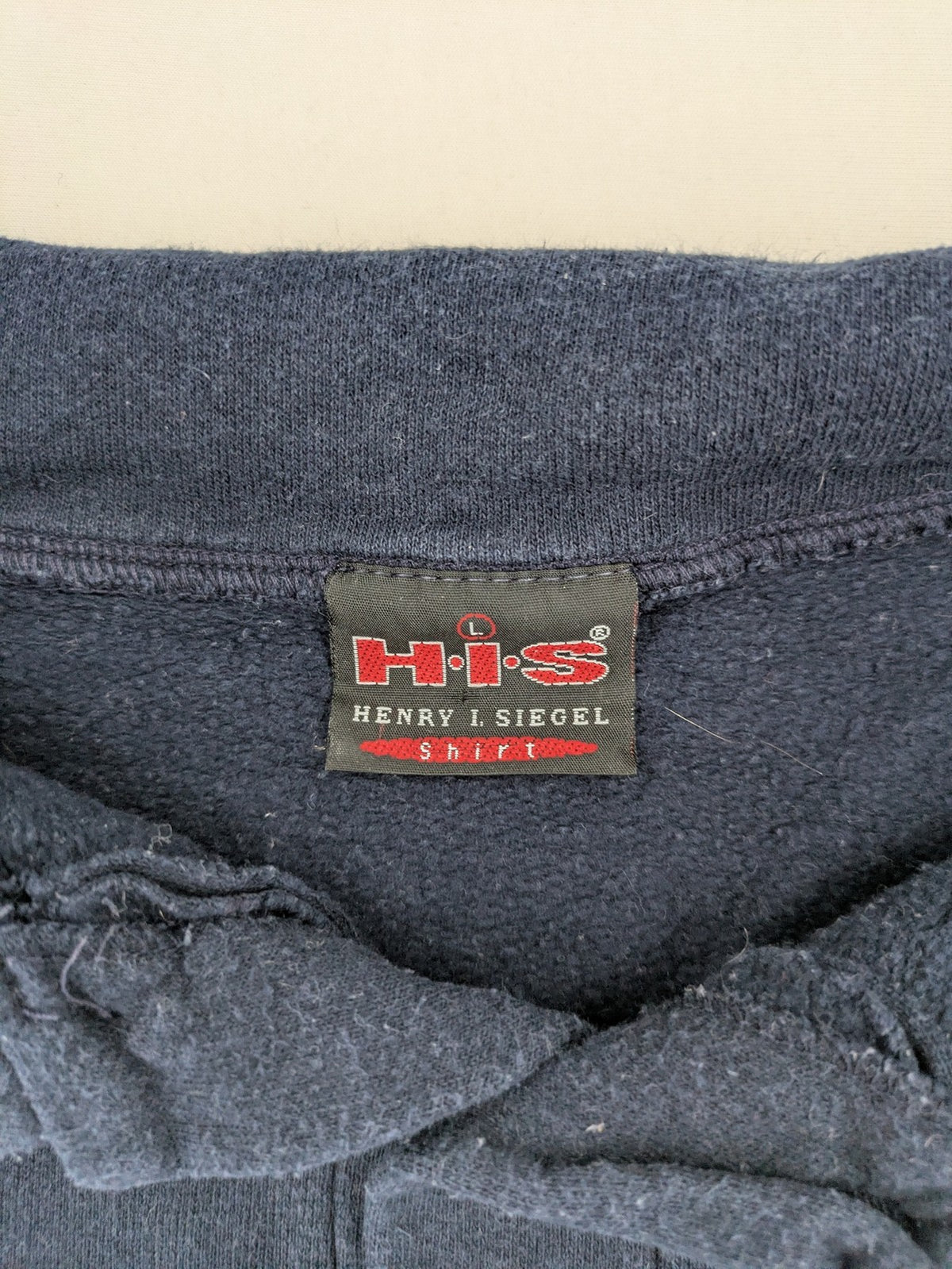 H.I.S navy turtle neck jumper with grey horizontal stripes and classic polo collar.