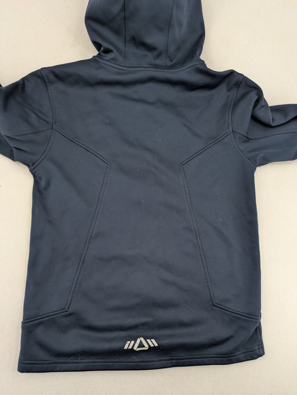 Crane navy softshell jacket with fleece lining, full zip, orange accent zippers.
