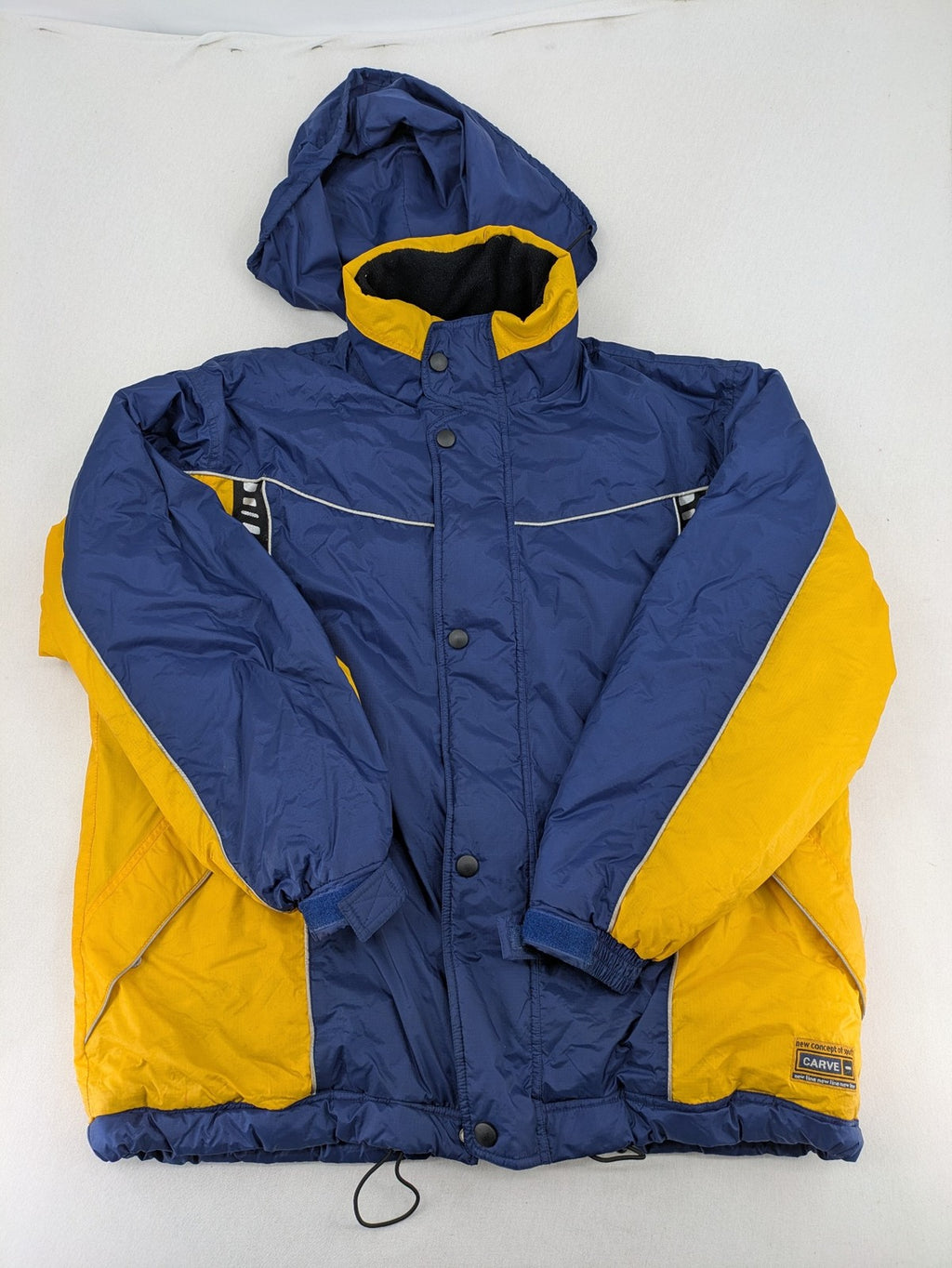 Shamp navy and yellow vintage ski jacket and pants set with retro design.