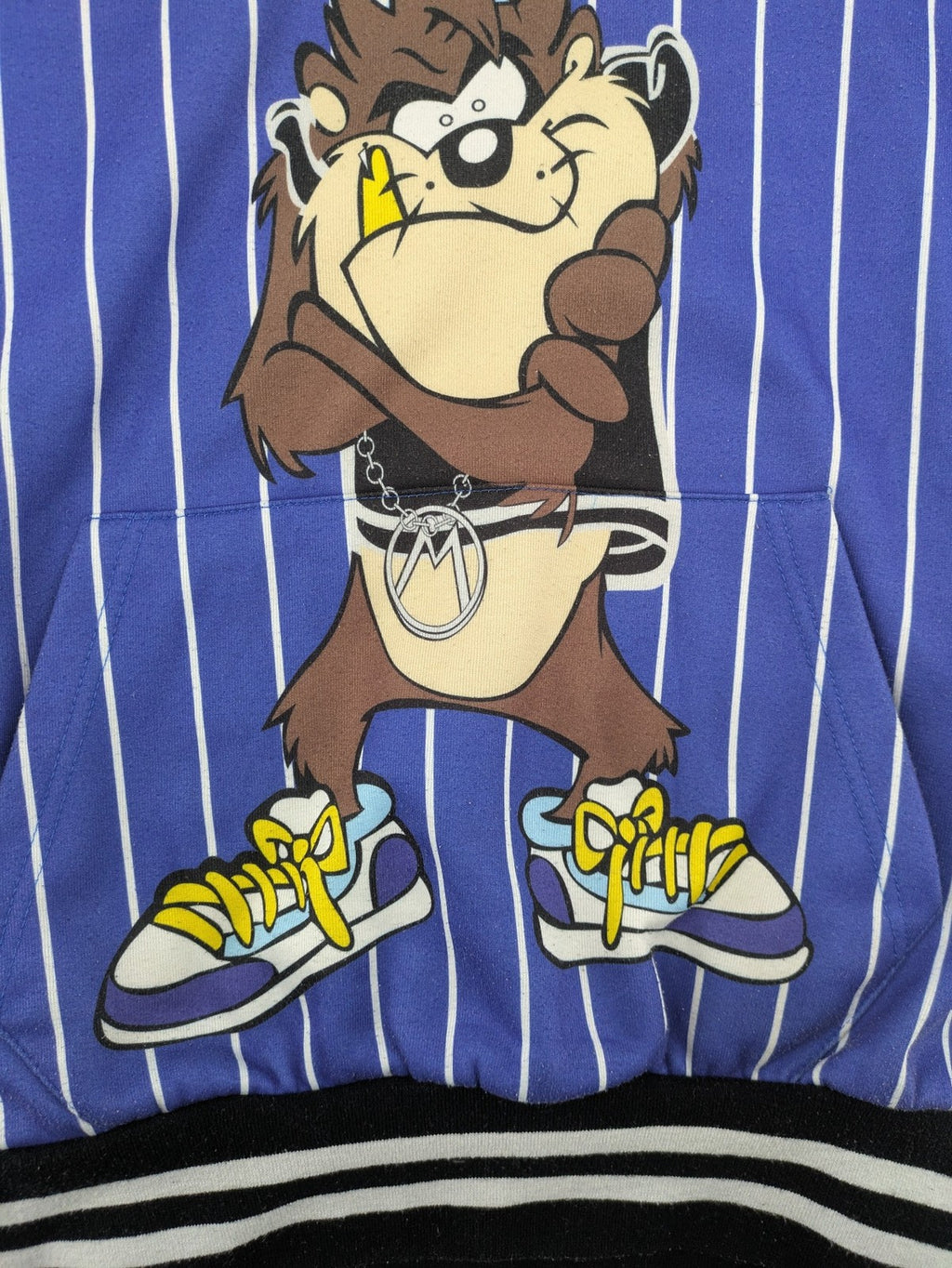 Moschino multi turtle neck jumper blue and white striped with Tasmanian Devil graphic.