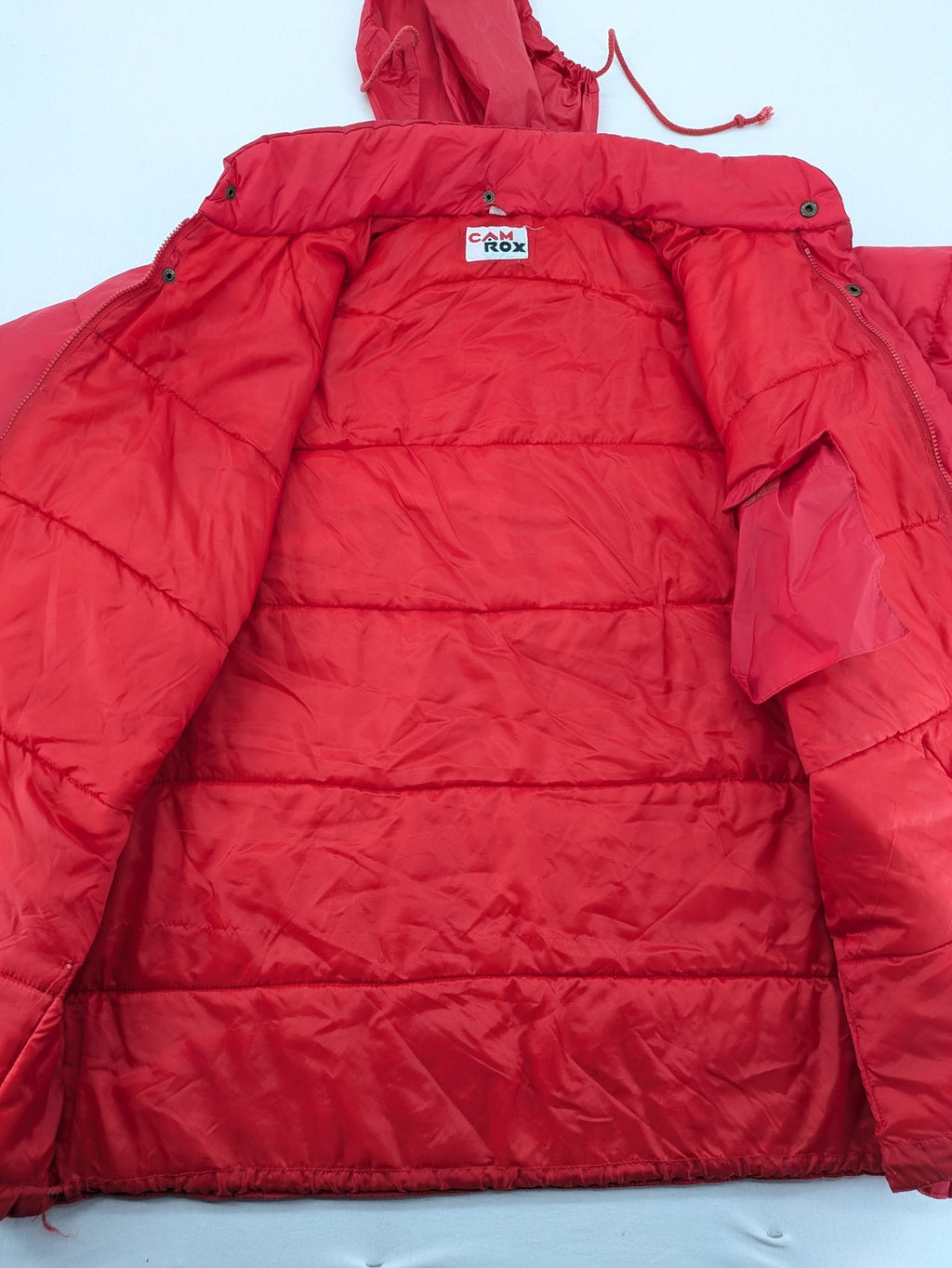 Rox red puffer vest with detachable sleeves and hood, vintage style.