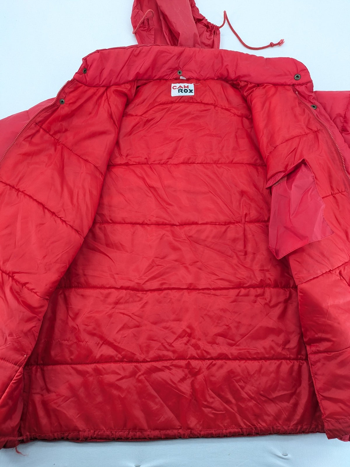 Rox red puffer vest with detachable sleeves and hood, vintage style.