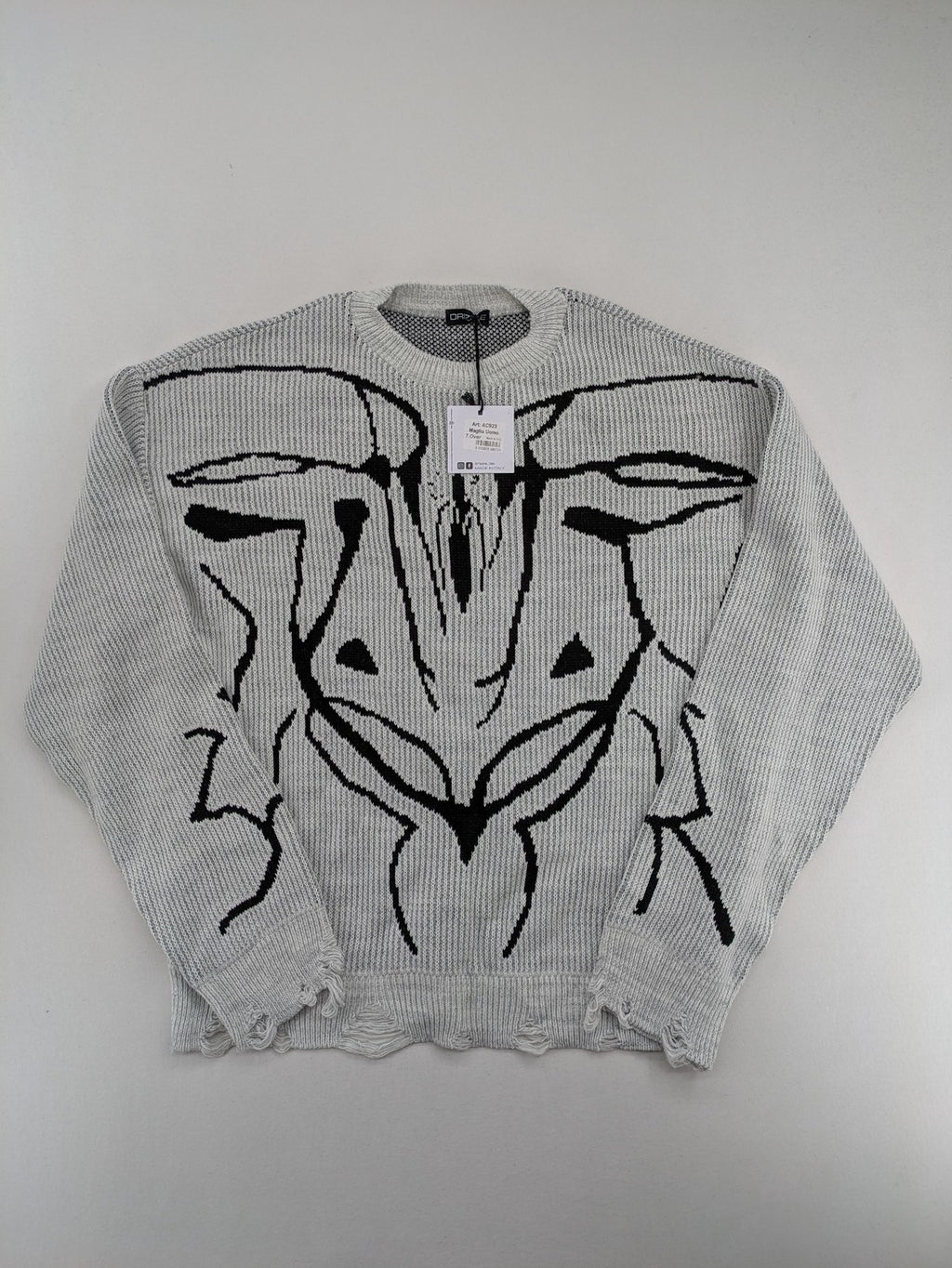 Drizzle turtle neck jumper black grey with abstract graphic print and distressed details.