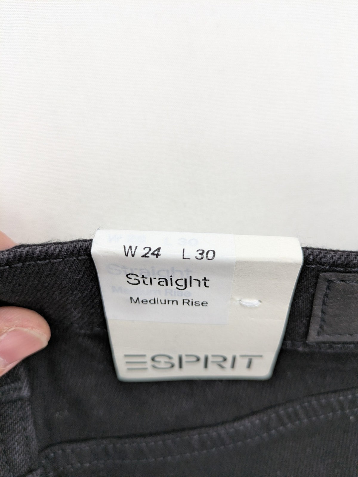 Esprit grey straight jeans with medium rise and original tags, classic denim style.