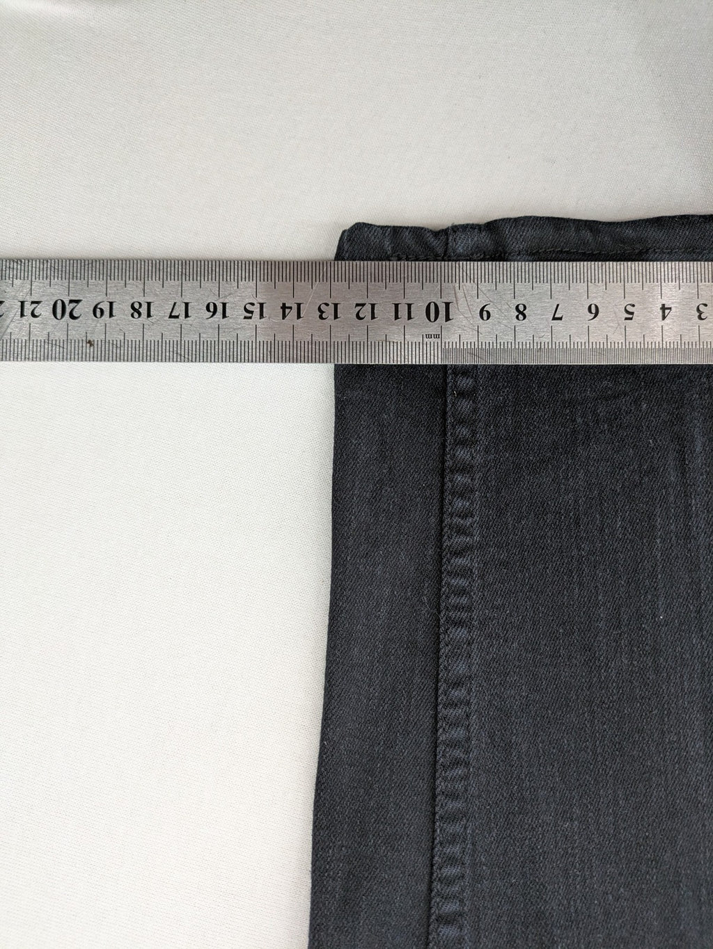 H&M grey skinny jeans with faded wash and soft stretch denim material.