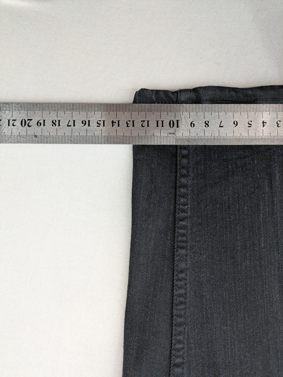 H&M grey skinny jeans with faded wash and soft stretch denim material.