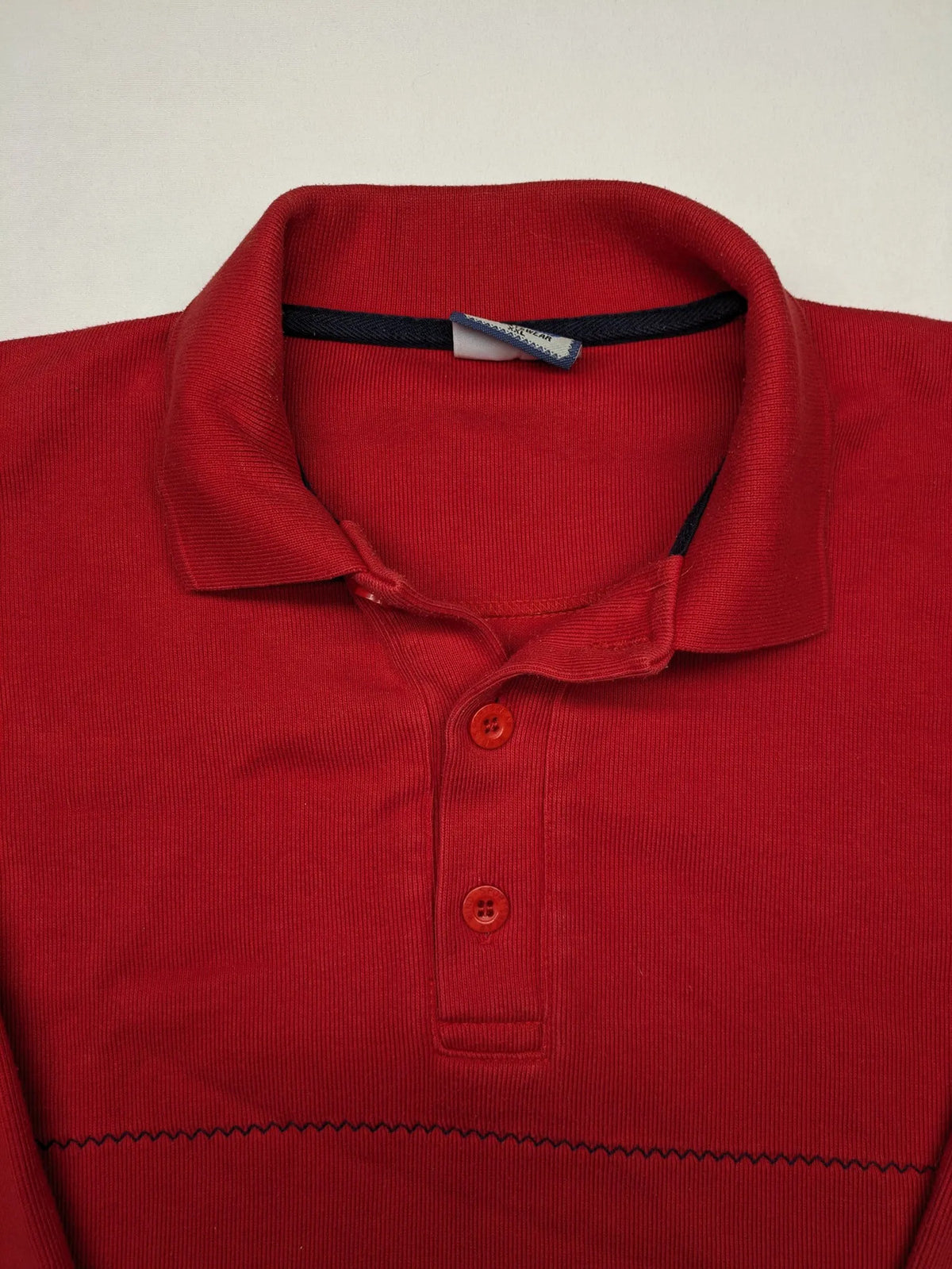 Wind Sportswear red turtle neck jumper with classic polo collar and zigzag stitching.