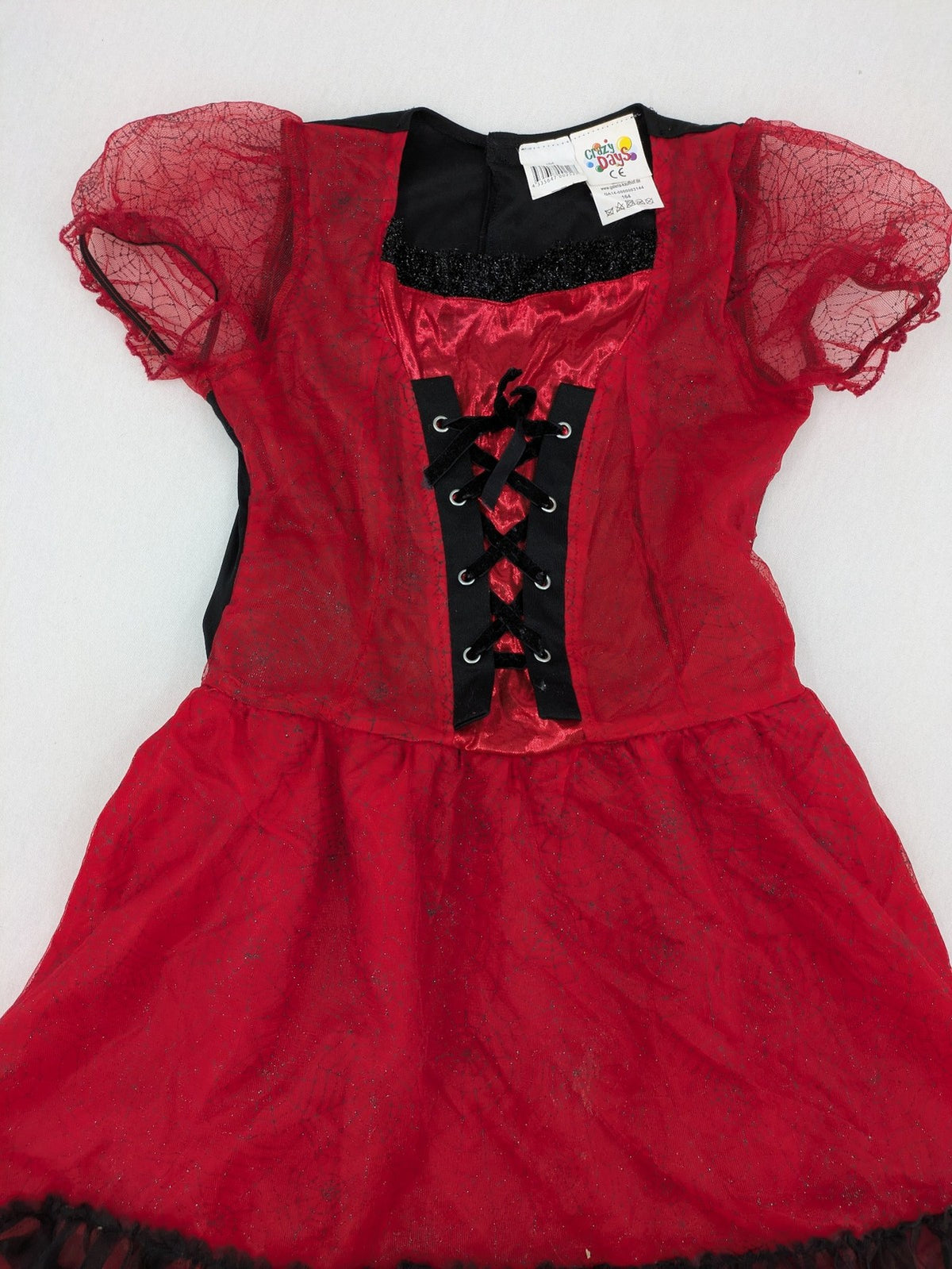 Perfekt red and black costume dress with corset lacing and spiderweb sleeves.