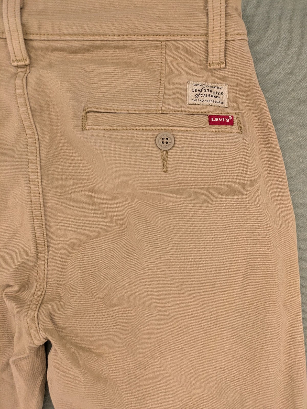 Levi's beige XX Chino pants slim taper fit with classic logo and quality fabric.