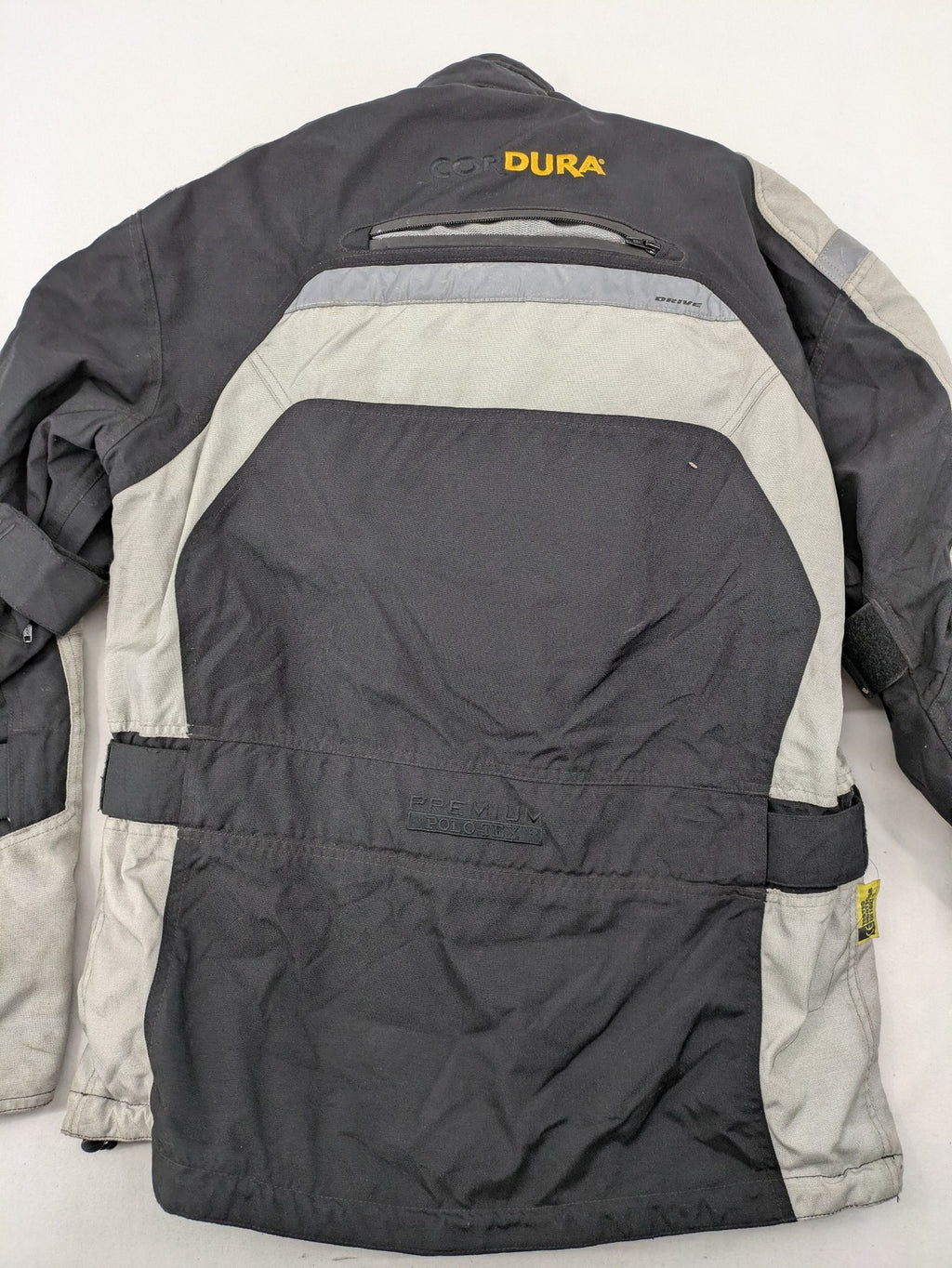 Polo motorcycle jacket cream durable Cordura fabric multiple pockets adjustable straps