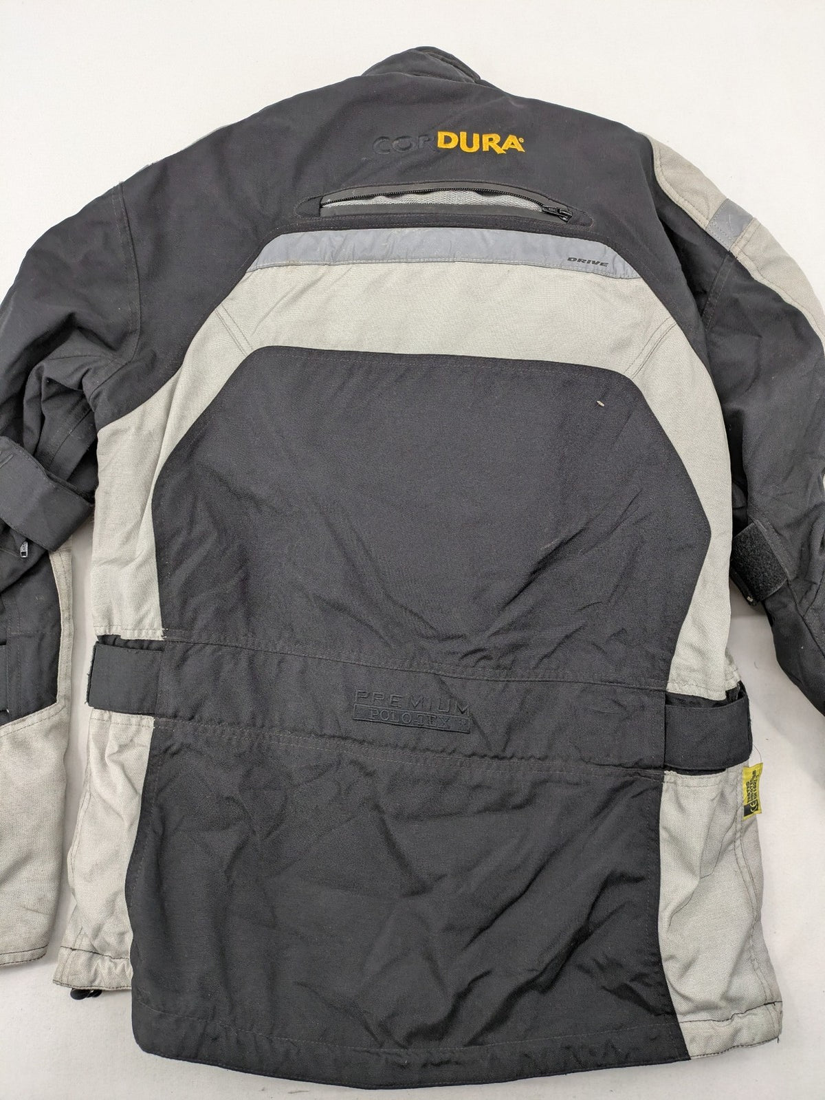 Polo motorcycle jacket cream durable Cordura fabric multiple pockets adjustable straps