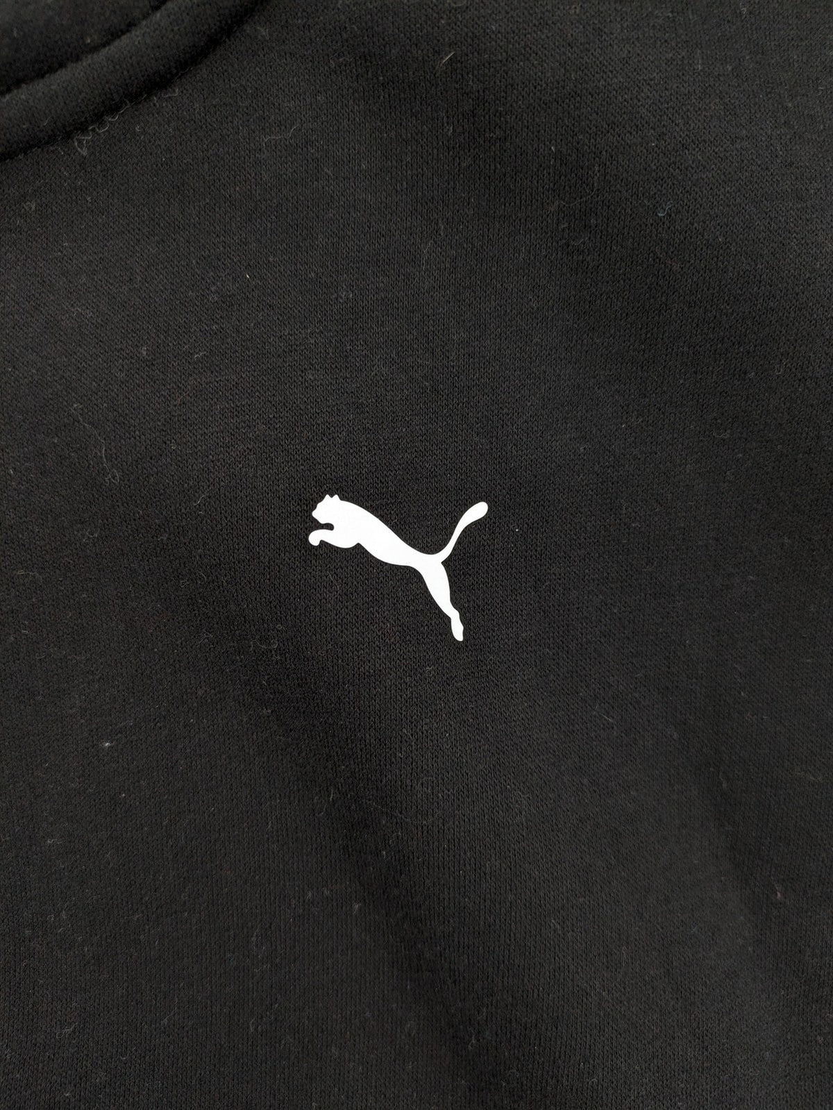 Puma grey zip-through hoodie with iconic logo and two practical pockets.