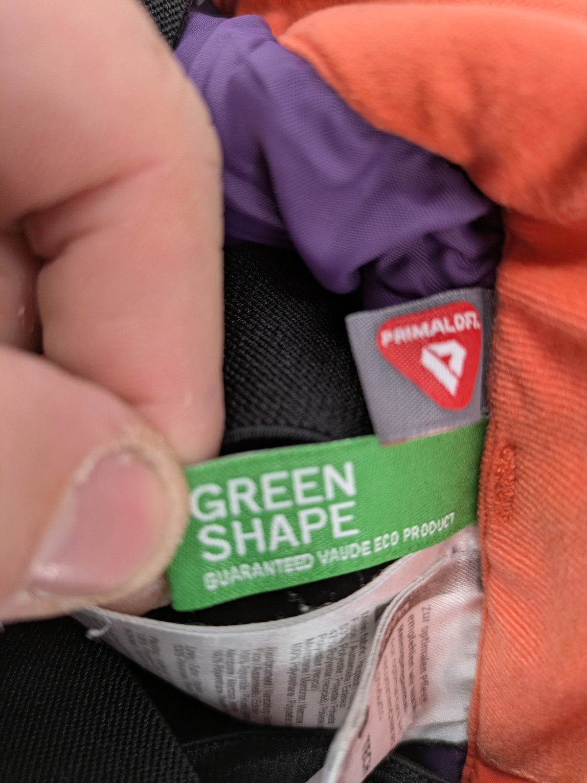 Vaude orange ski pants with logo, Primaloft insulation, and Ceplex Active membrane.