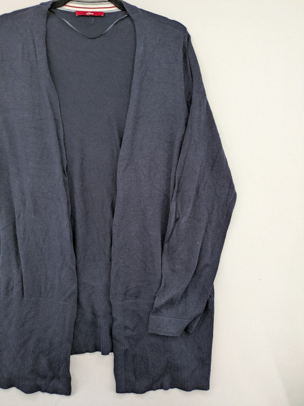 s.Oliver green turtle neck jumper soft viscose blend with ribbed cuffs and subtle logo.