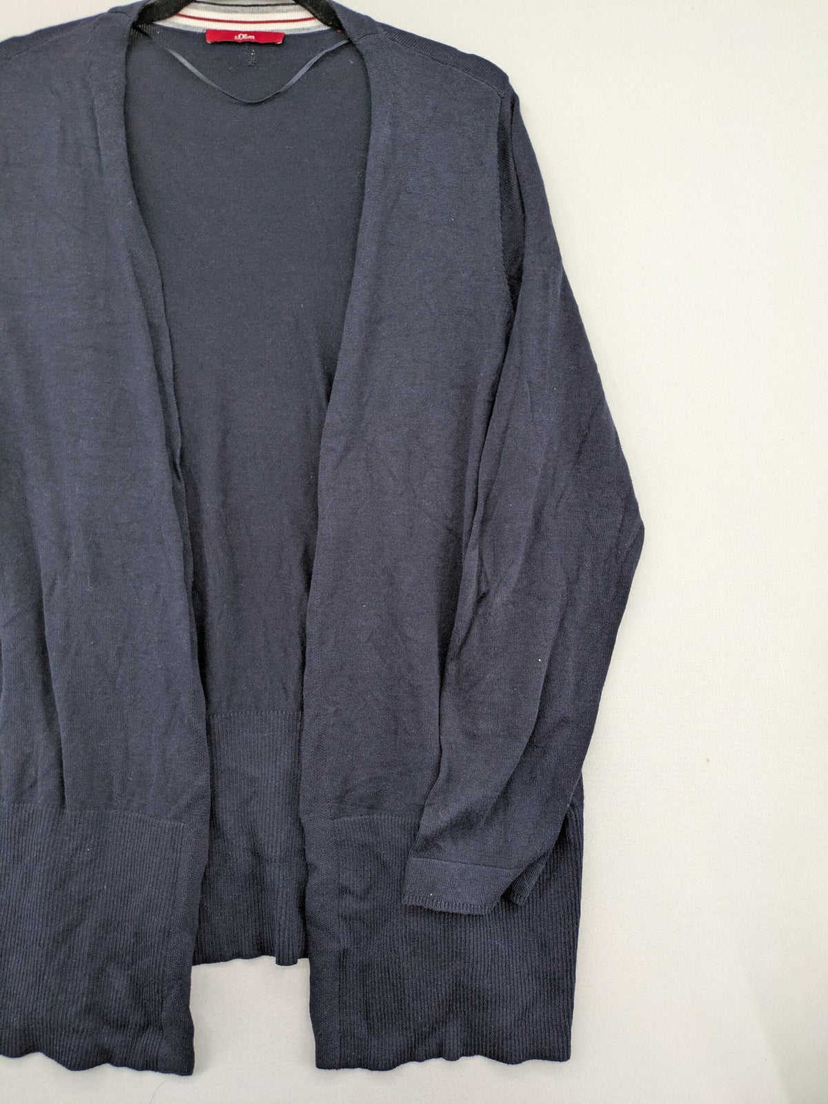 s.Oliver green turtle neck jumper soft viscose blend with ribbed cuffs and subtle logo.