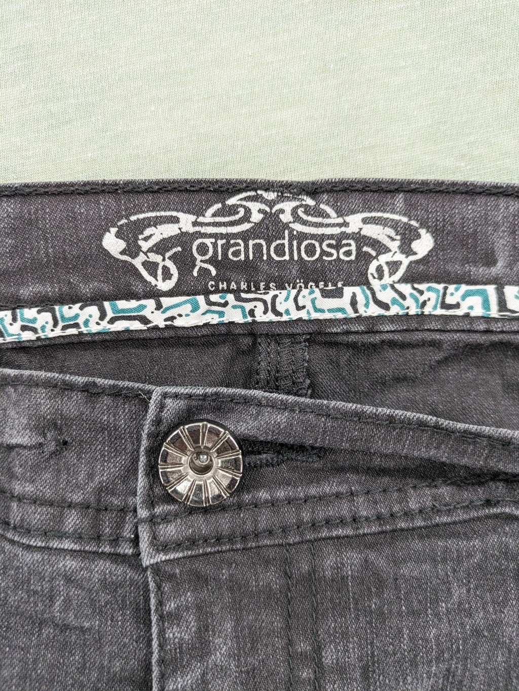 Charles Vögele grey straight jeans with elastic waistband and decorative studs on pockets.