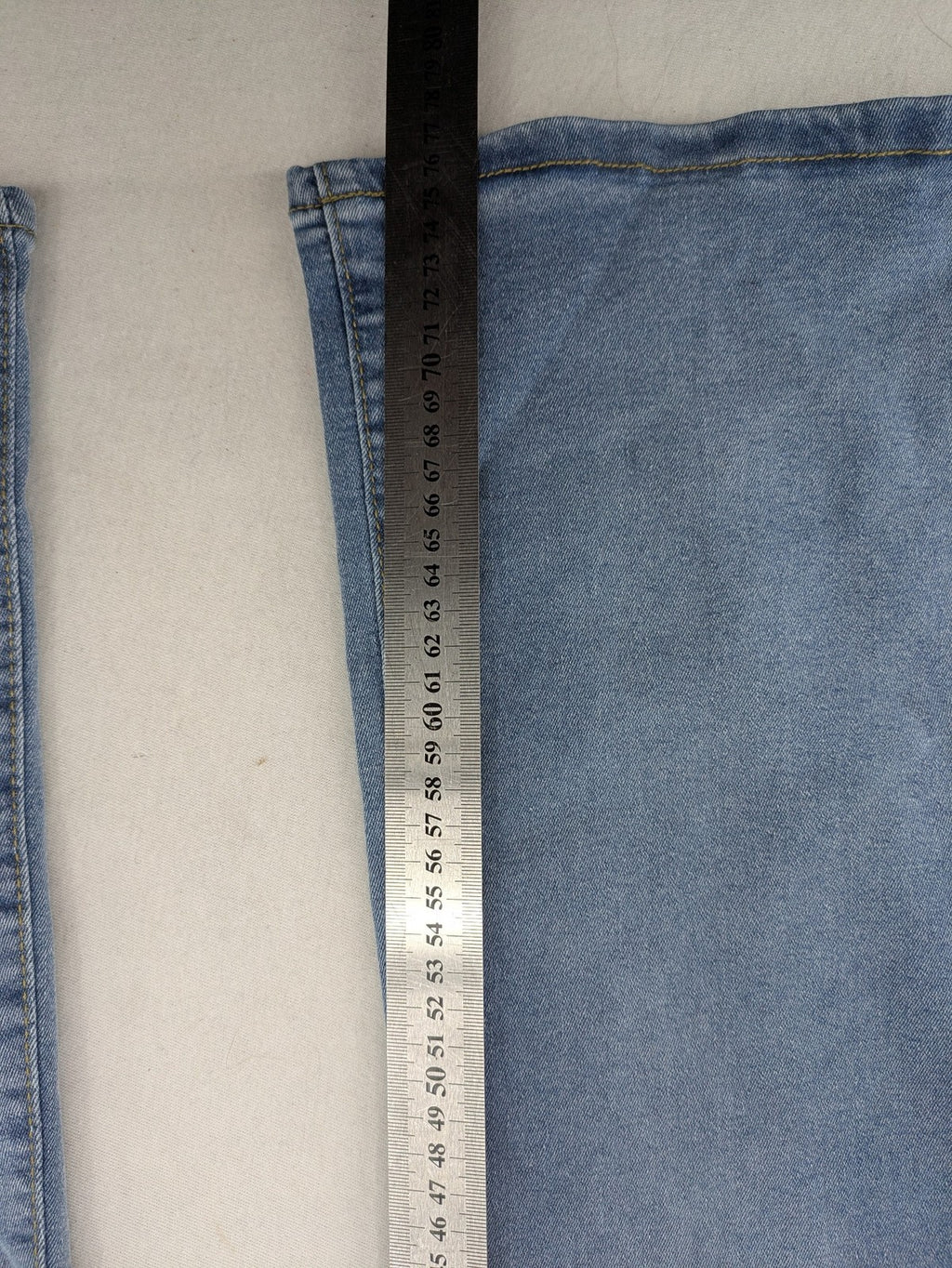 C&A blue bootcut jeans high waist stretch denim with double button closure.