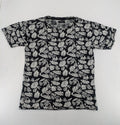 Zara Man black and white t-shirt with allover leaf print and textured knit fabric.