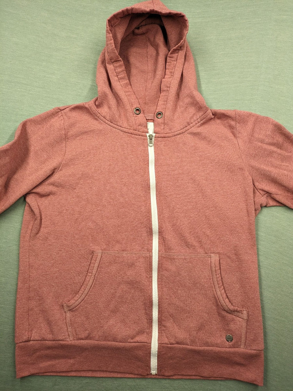 ONLY pink zip-through hoodie with hood, front zipper, and two pockets.