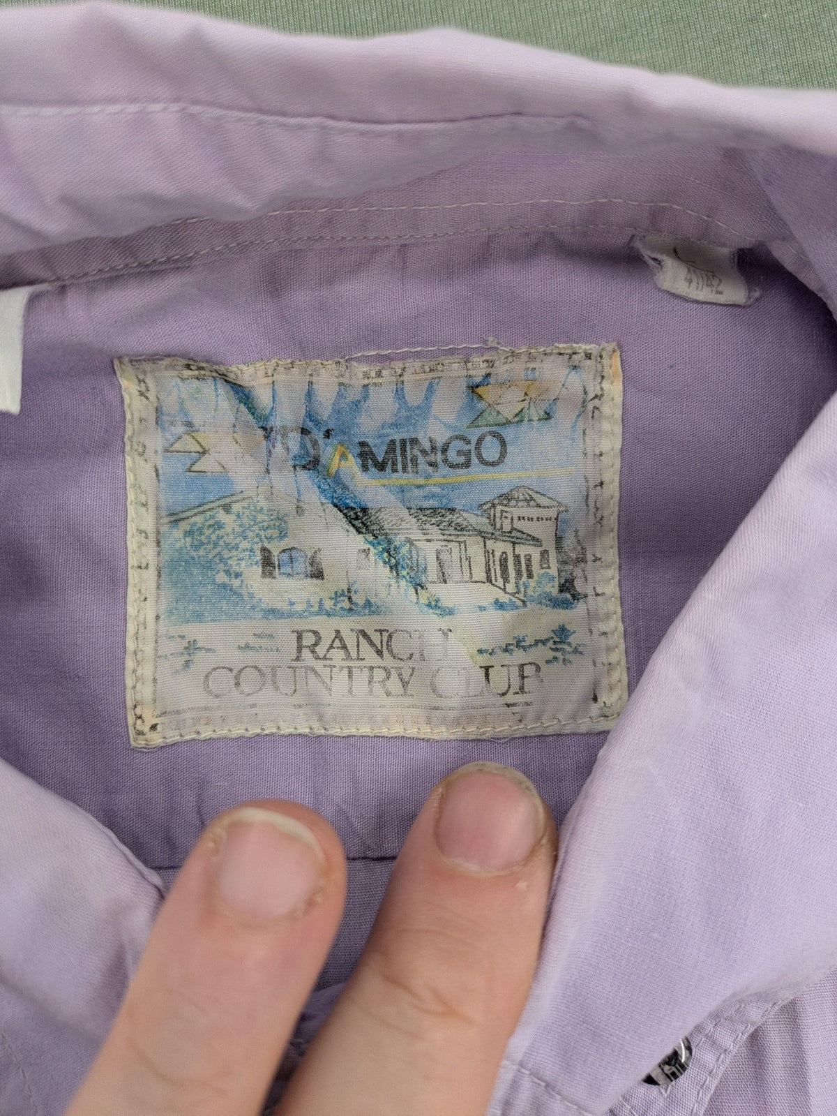 Mingo purple short-sleeve button-down shirt with classic collar and chest pockets.