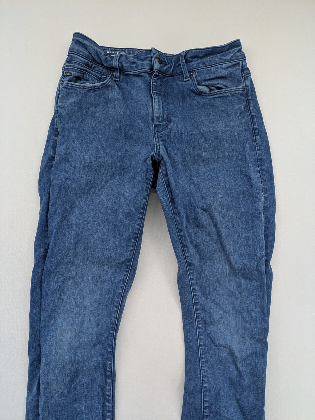 G-Star Raw blue high super skinny jeans with medium wash and logo details.