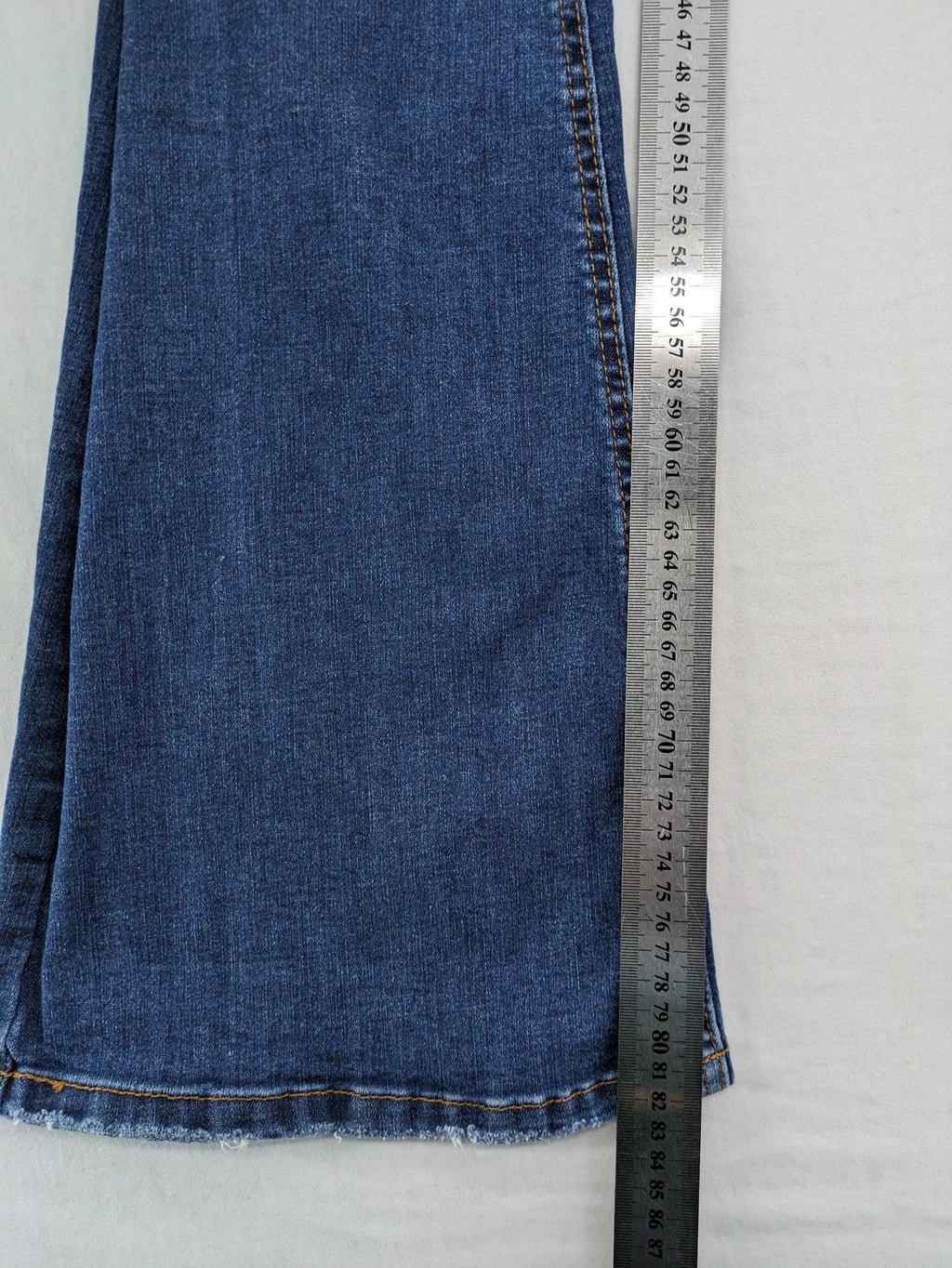Pull&Bear blue flare jeans high waist with classic button closure and stylish silhouette.