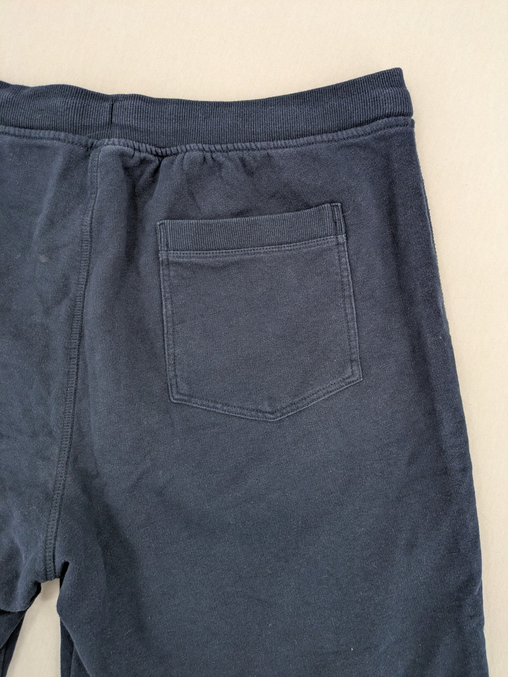 Livergy blue sweatshorts with "Northeast Sailors" graphic print and elastic waistband.