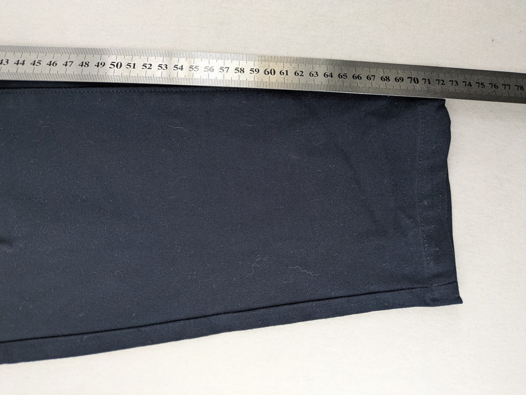 Zara navy chinos flat front design with stretch fabric for comfort and versatility.