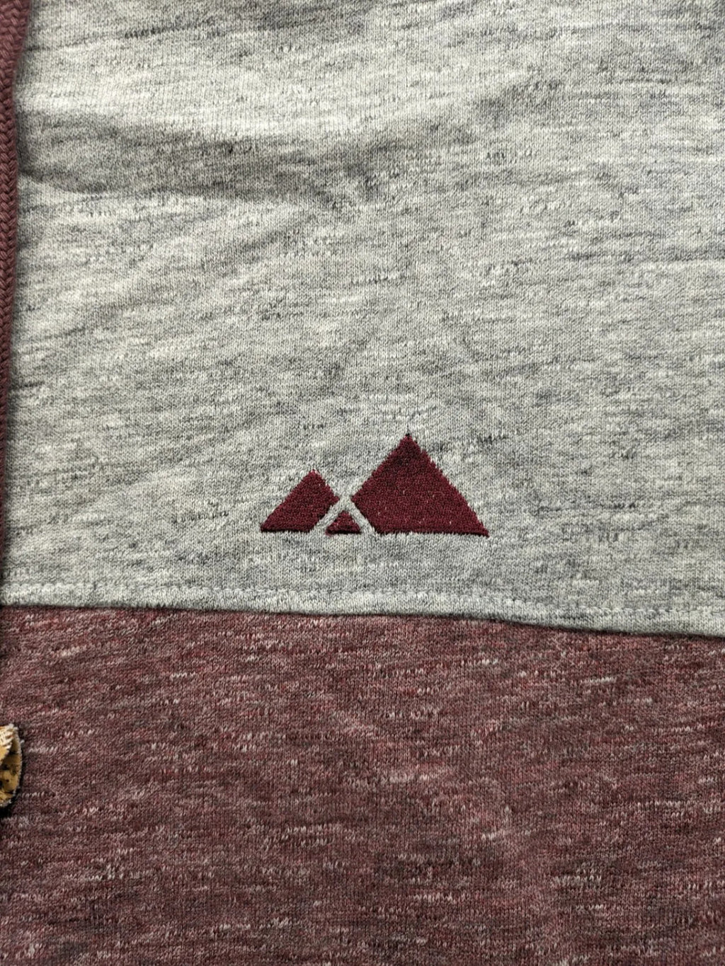 Bleed turtle neck jumper grey burgundy colorblock design with adjustable hood and kangaroo pocket.