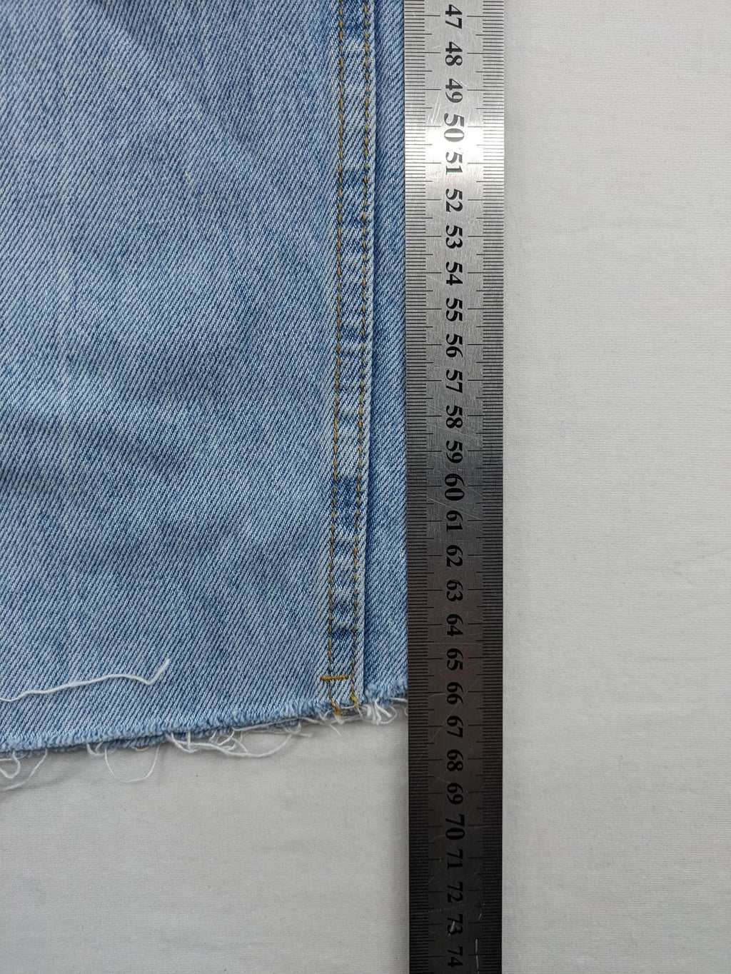 FB Sister blue straight leg jeans high rise with distressed detailing and button fly.